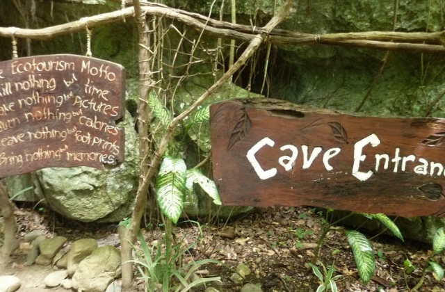 Ecotourism motto at the cave entrance