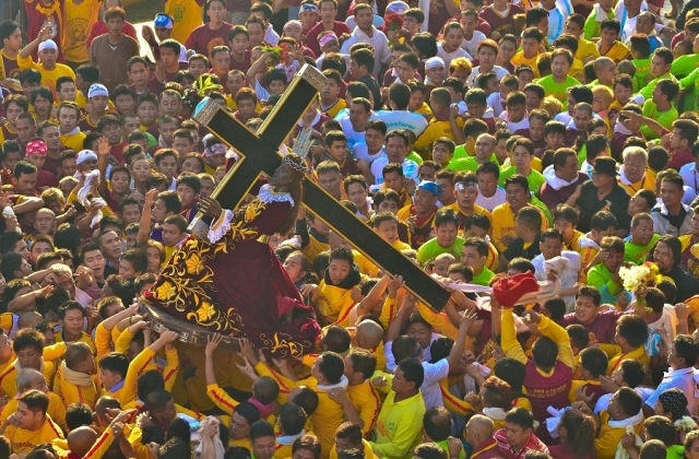 Millions gather for a chance to touch the Black Nazarene.